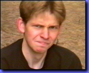 Collett looks disapprovingly at Cam after we smash a computer monitor all over his back yard!